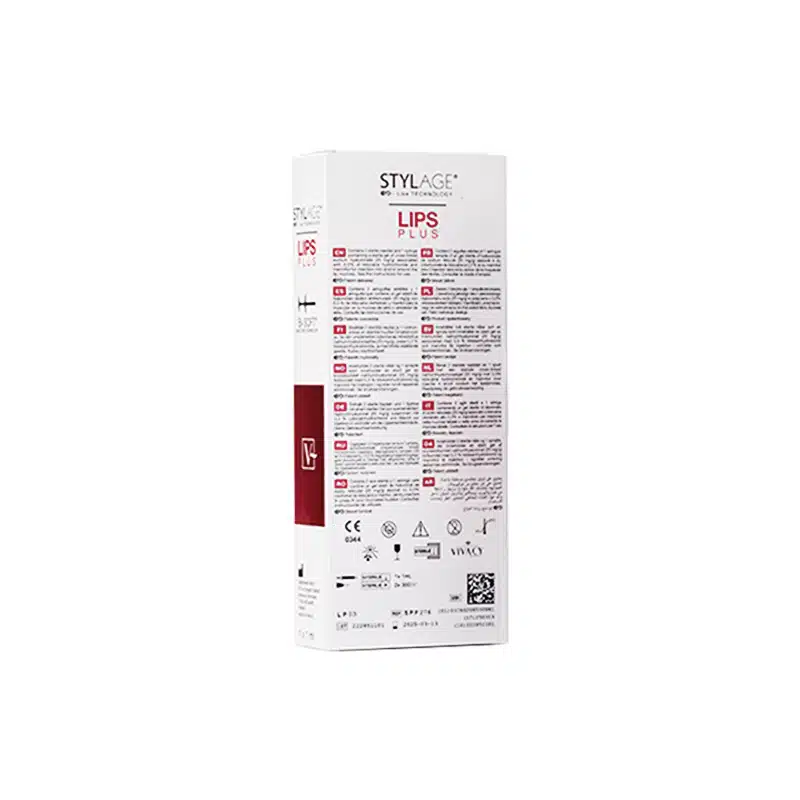 A white, rectangular box of STYLAGE® LIPS PLUS BI-SOFT® lip enhancement product. The front of the box features a red section with text and various icons indicating features and certifications. The product details are printed in multiple languages on the box.