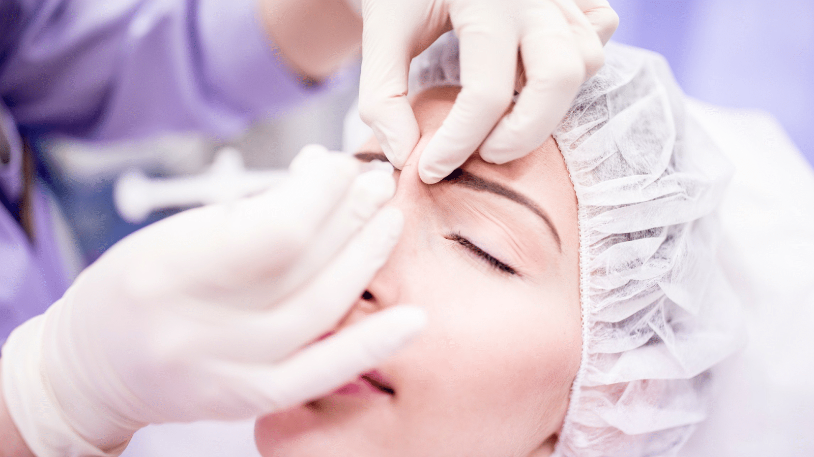 Woman receiving Dermalax filler.