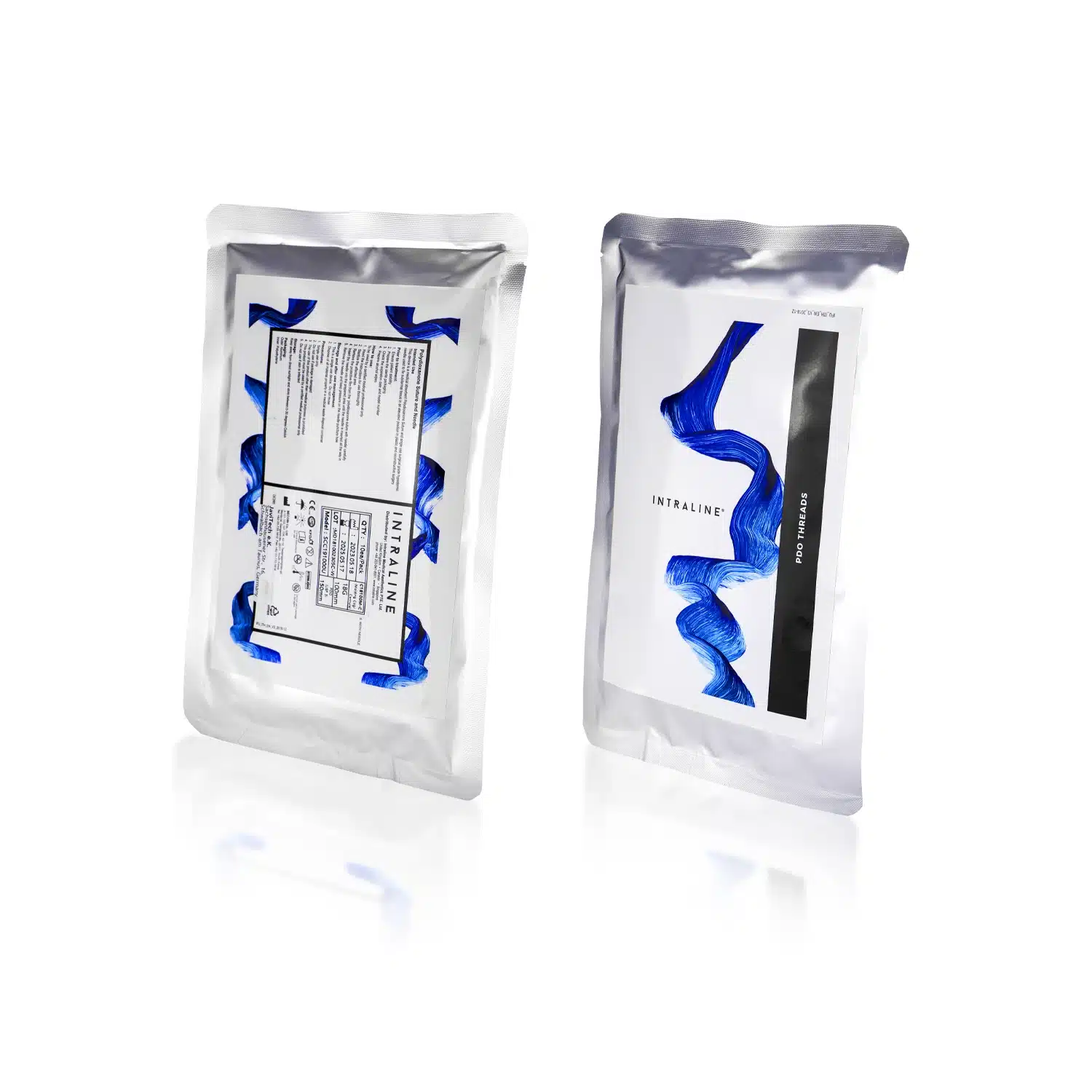 Two silver foil packets are shown. One packet displays a product information label, while the other shows the branding "INTRALINE® COG C18100M-C Dimension 720 18G 100mm" with a blue, ribbon-like design. Both packets are upright against a white background.
