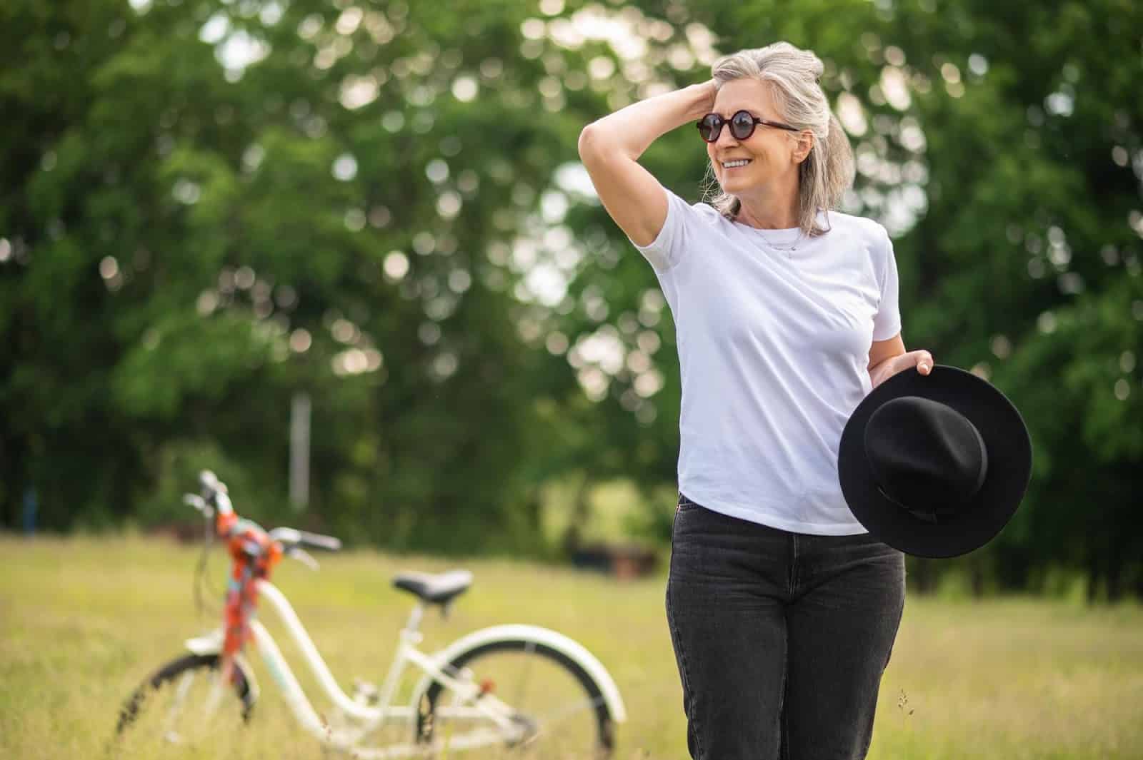 A senior woman enjoying an active lifestyle thanks to Orthovisc injections.