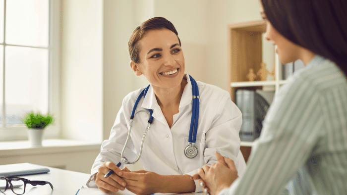 Doctor performing thorough consultation on patient interested in Botox.