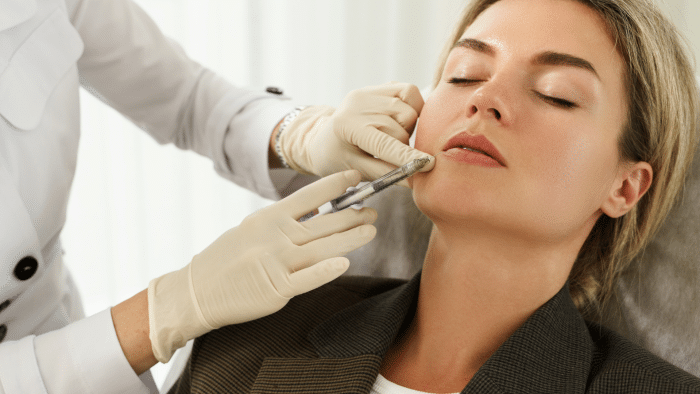 Woman getting facial rejuvenation.