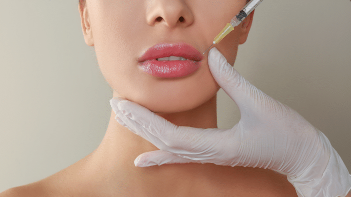 Woman getting injection. 