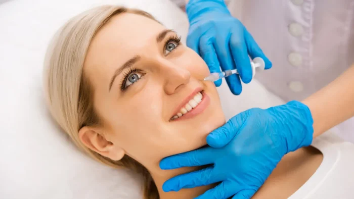 Woman getting a facial treatment. 