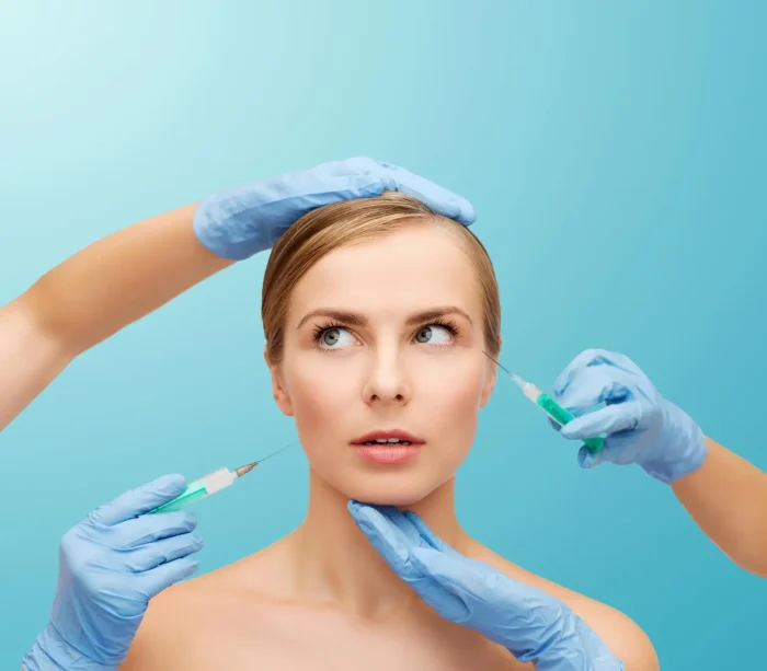 Woman choosing between two fillers.