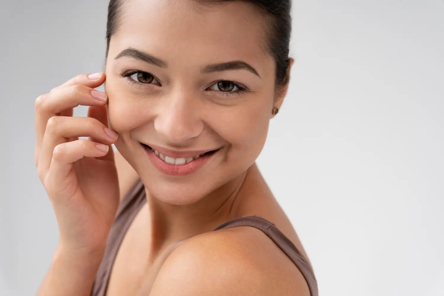 Woman with glowing skin. 