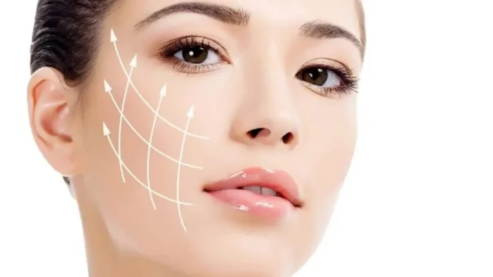 Woman getting facial treatment.