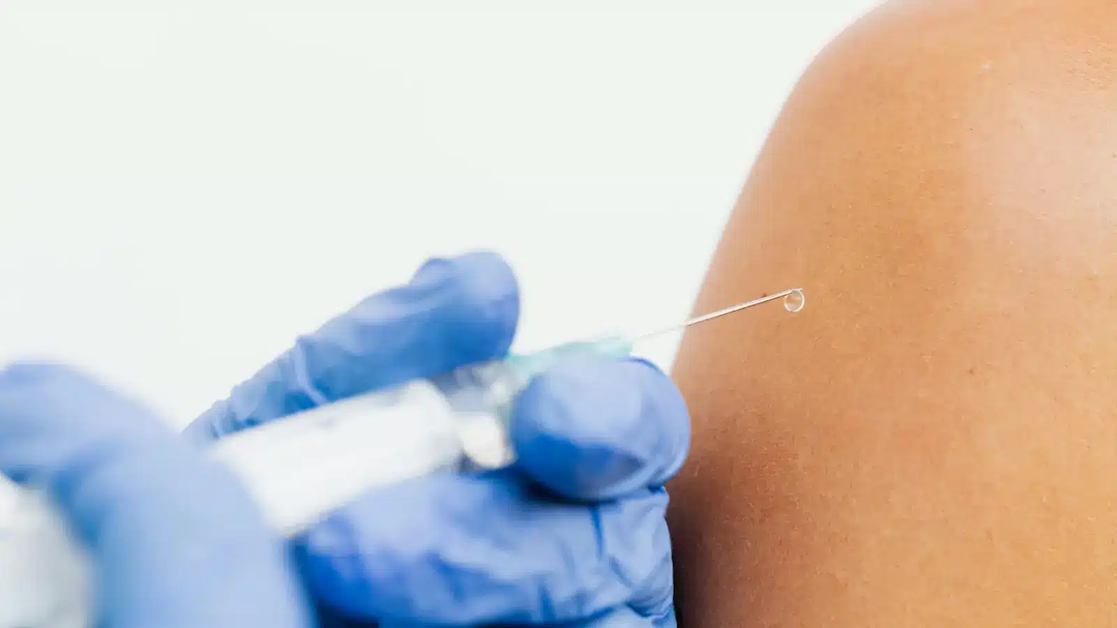 Person getting injected.