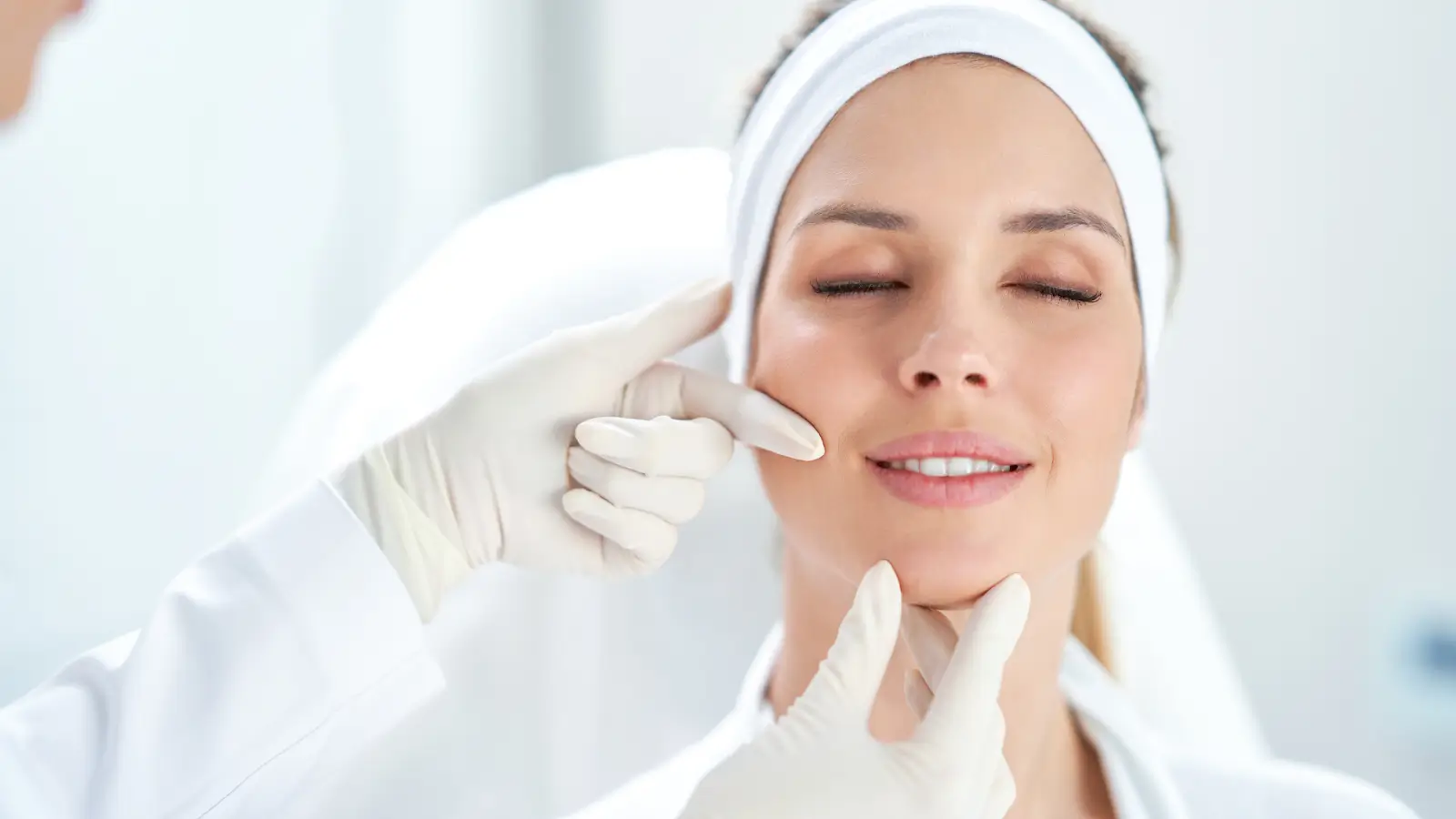 Woman getting face checked. 