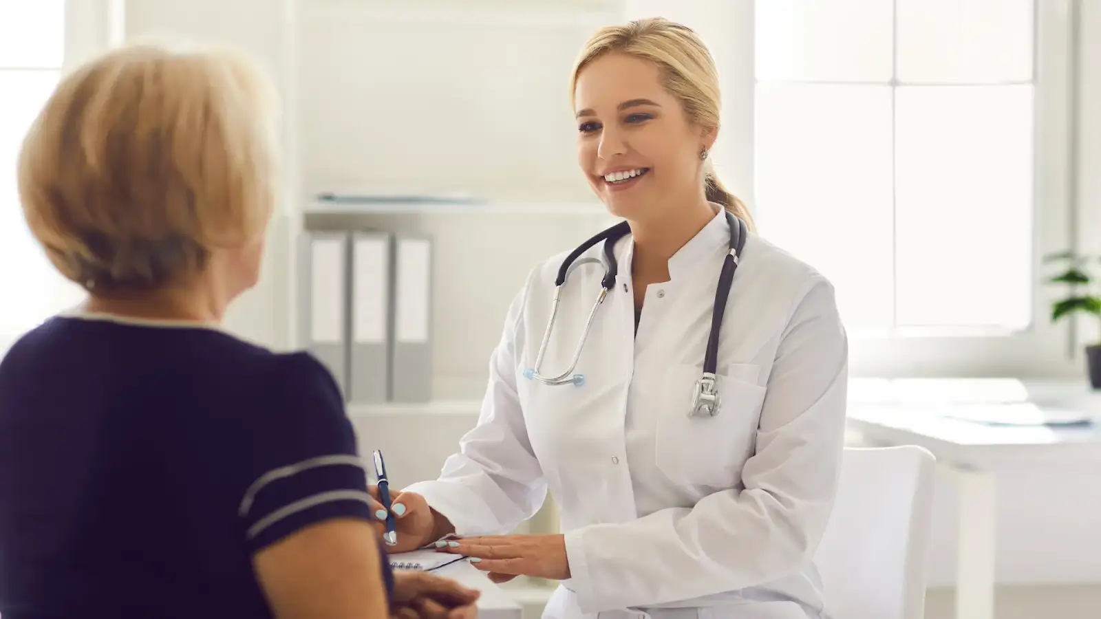 Doctor talking to patient.