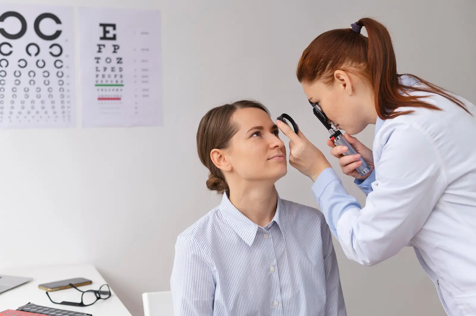 Patient getting an eye check up. 