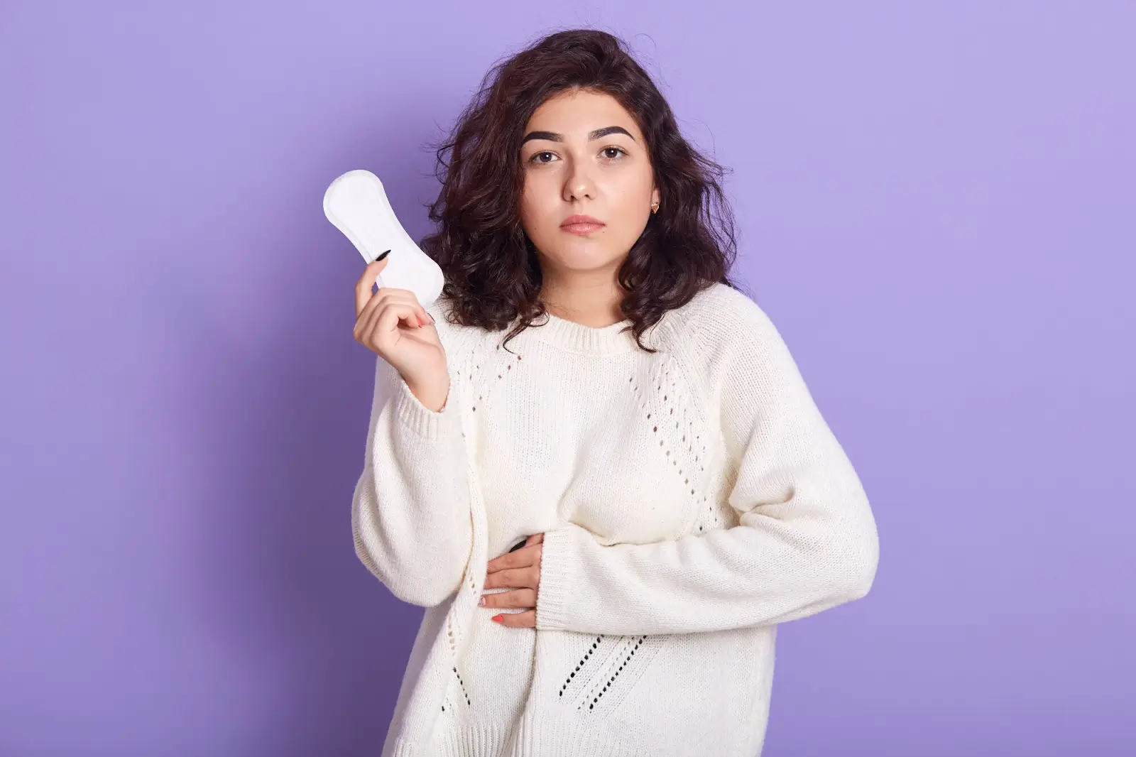 Woman holding a napkin.