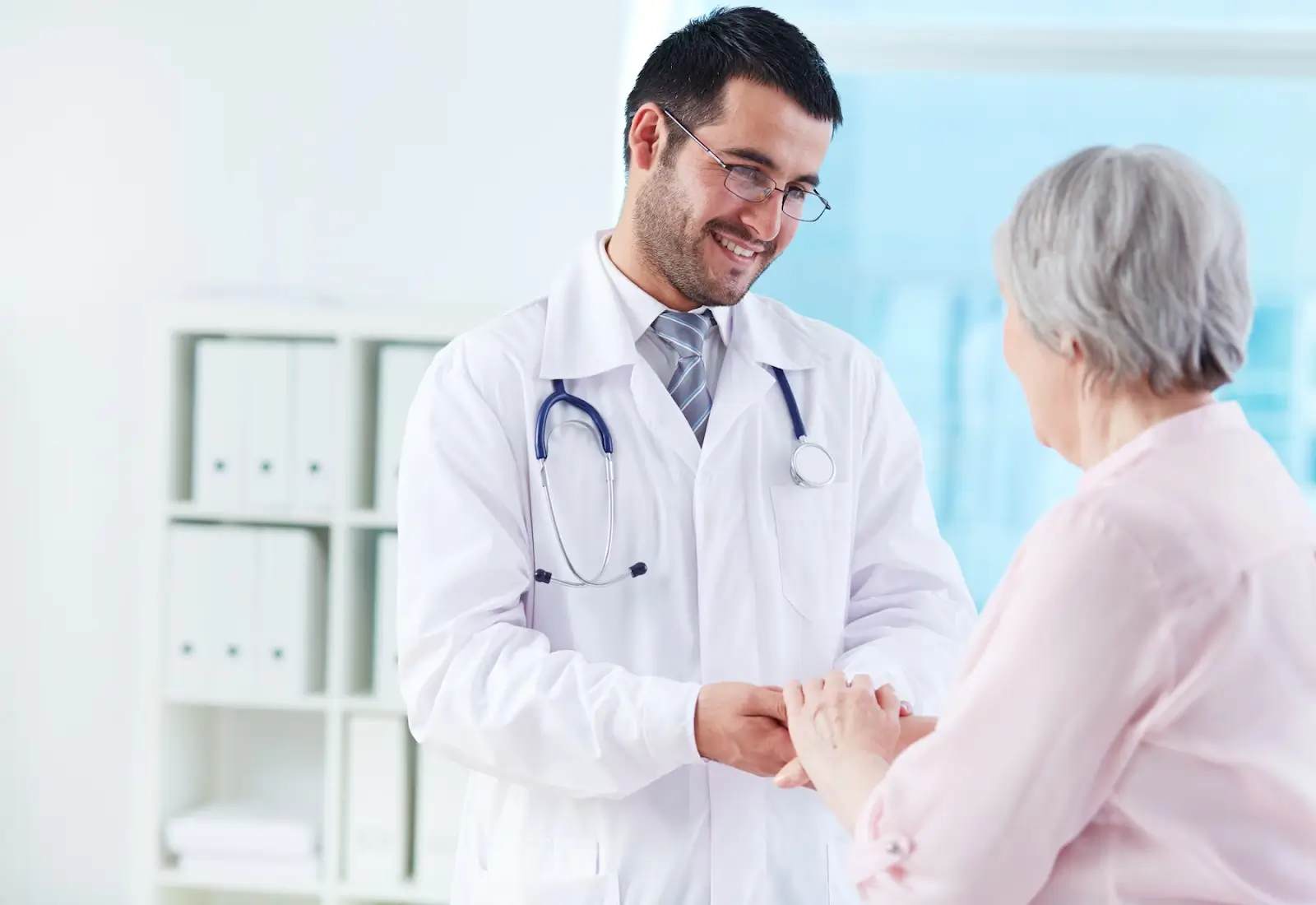 Person talking to doctor.