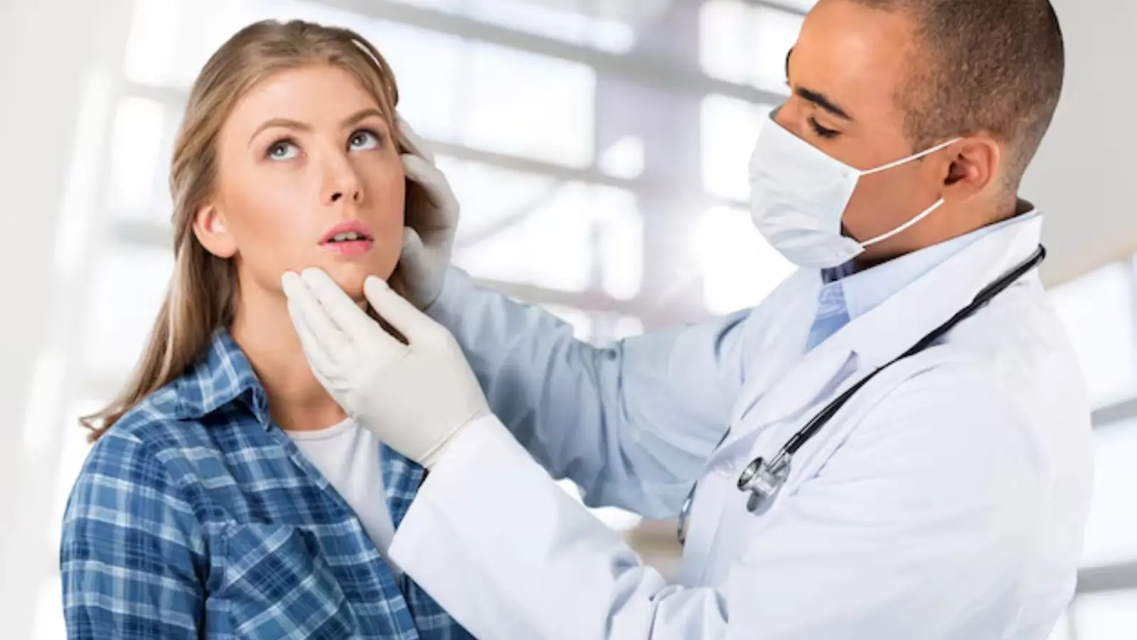 Doctor checking the patient.