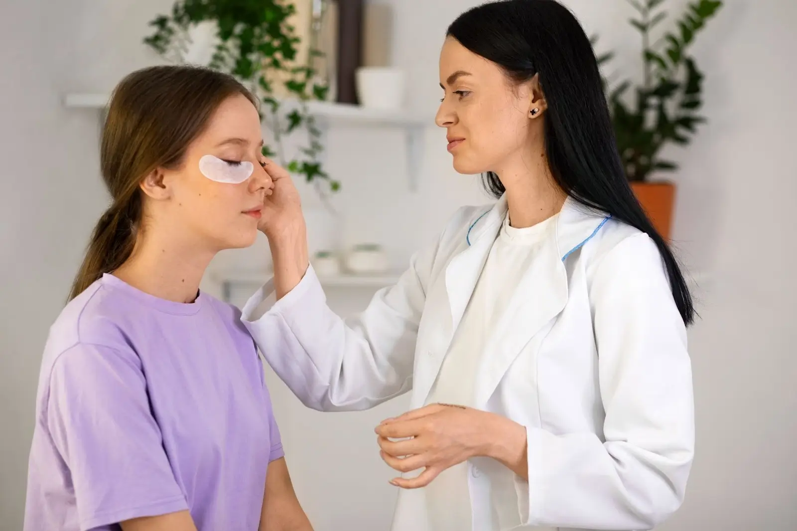 Doctor fixing patient's face. 