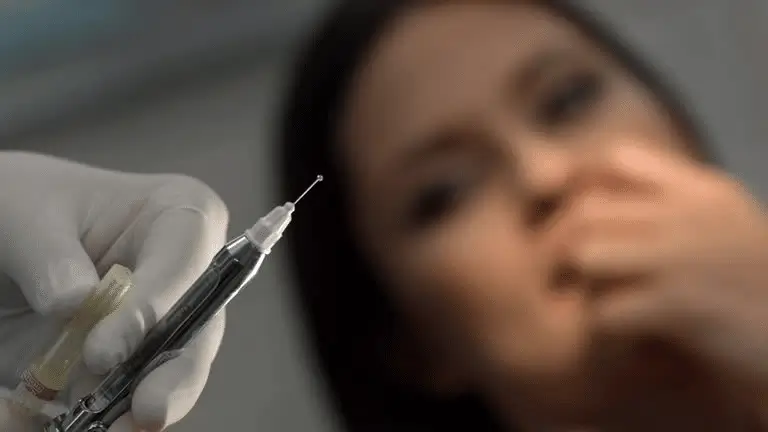 Person getting an injection. 