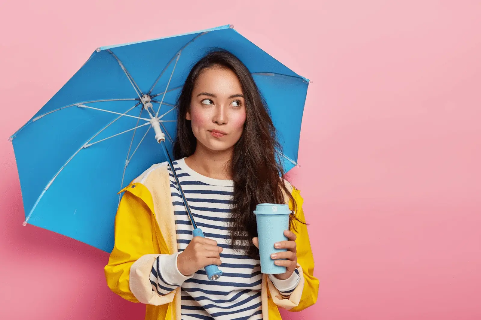 Person under an umbrella after a PRX-T33 treatment. 
