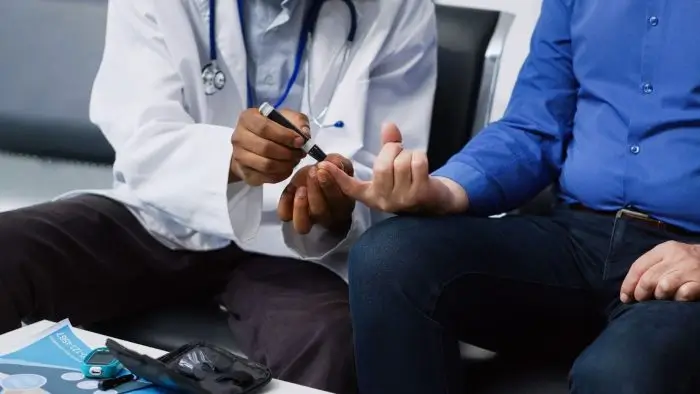 A person getting checked for Entyvio treatment.