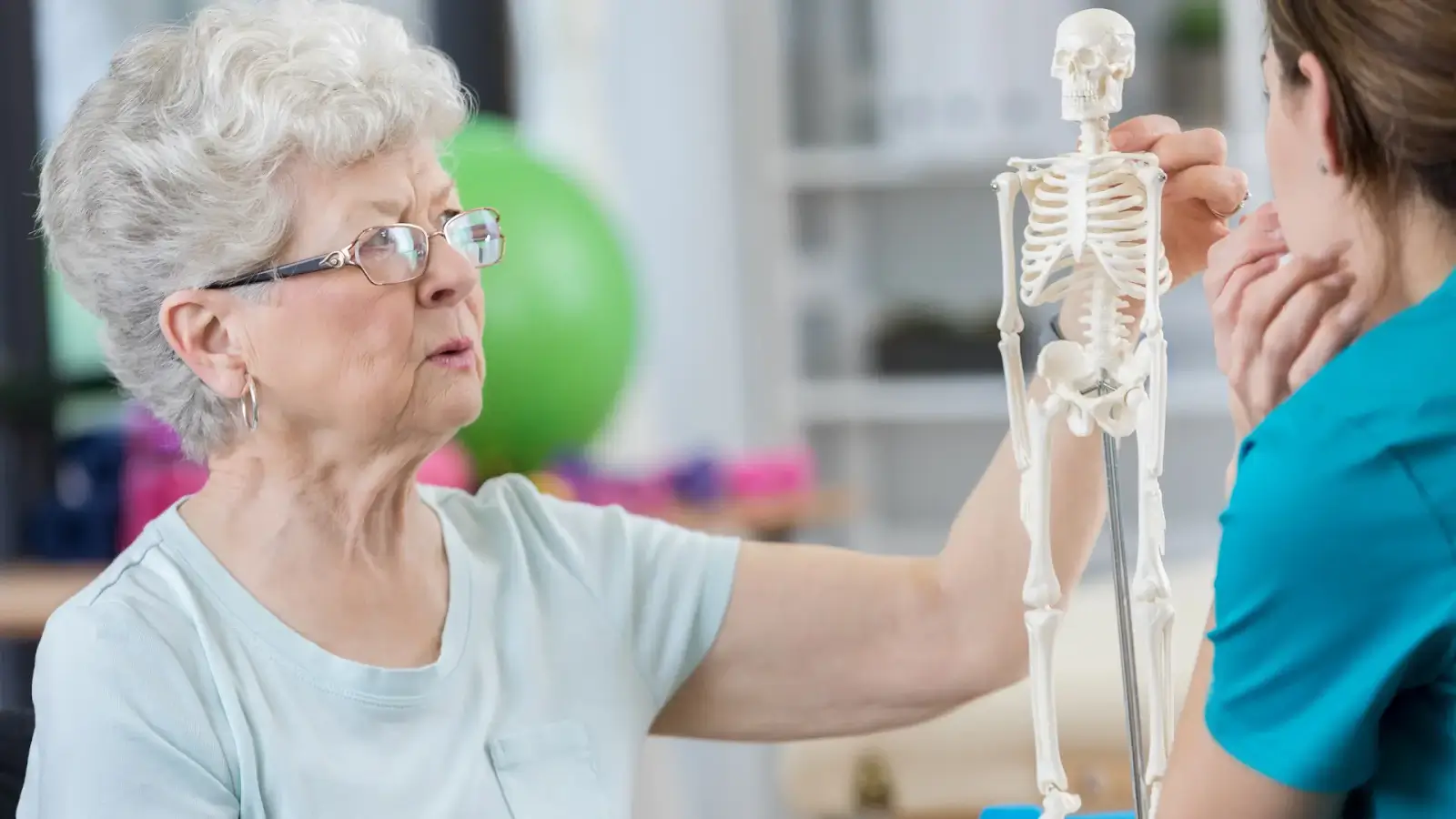 A person describing the Evenity treatment process to a prospective patient. 