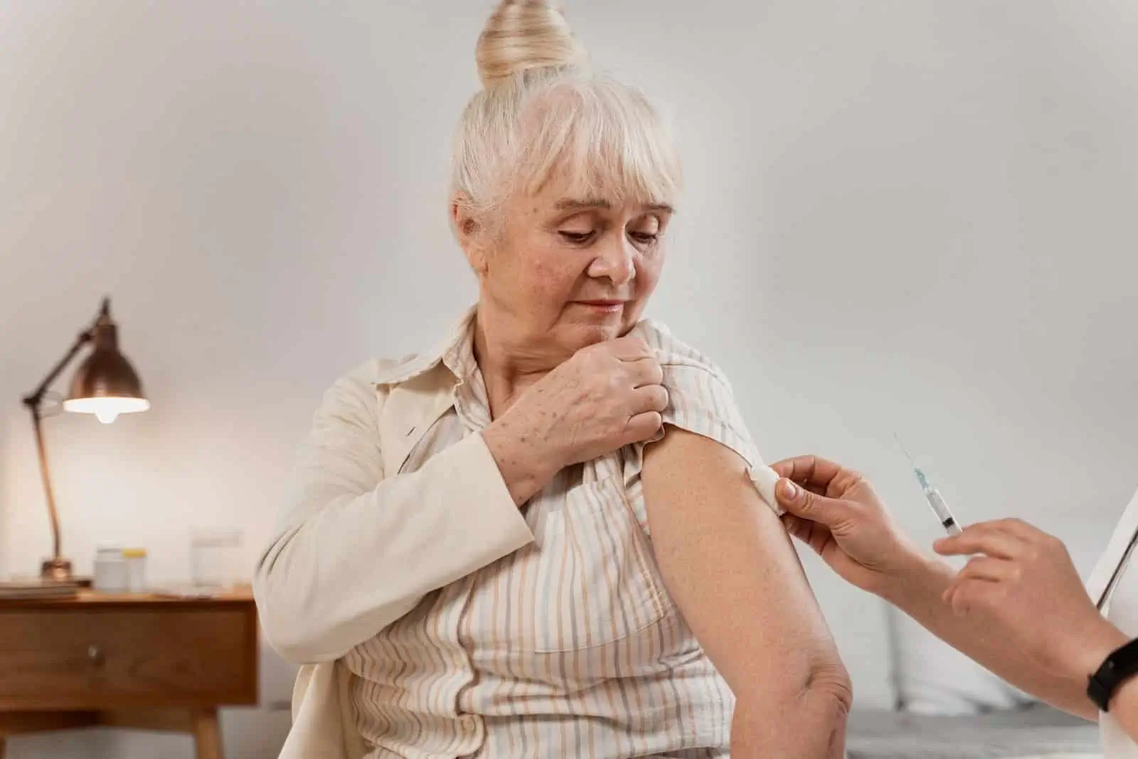 Person getting an Evenity injection.