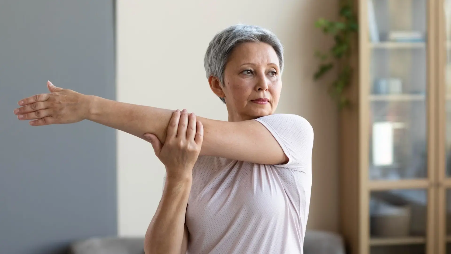 A woman stretching.